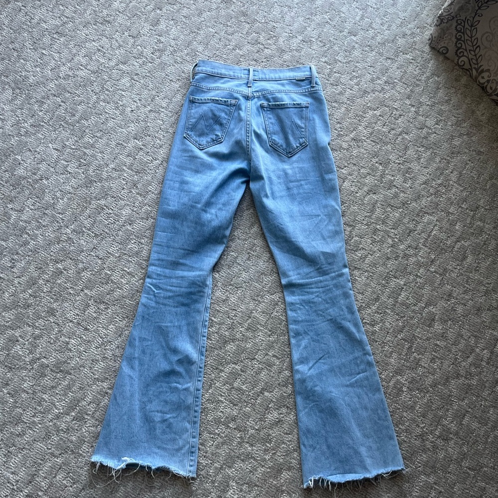 MOTHER Light Blue Flare Jeans with Raw Hem